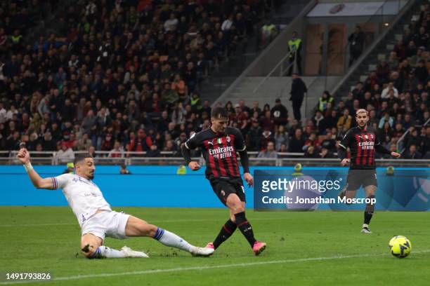 Koray Gunter of UC Sampdoria attempts to block Brahim Diaz of AC Milan's shot as he scores to give the side a 4-1 lead during the Serie A match...