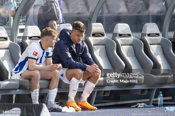 Florian Niederlechner and Maximilian Mittelstädt of Hertha BSC react after the Bundesliga match between Hertha BSC and VfL Bochum 1848 at...