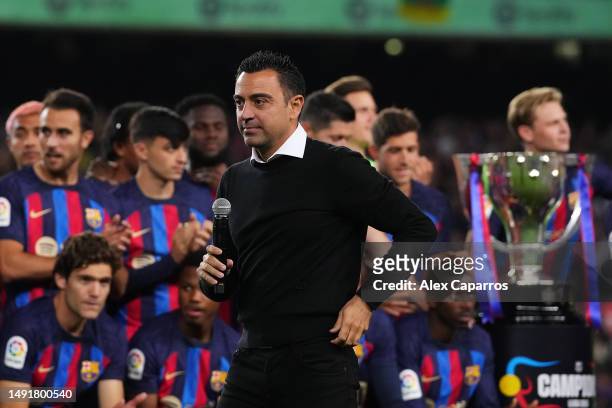 Xavi, Head Coach of FC Barcelona, speaks in a presentation following receiving the LaLiga trophy after the LaLiga Santander match between FC...