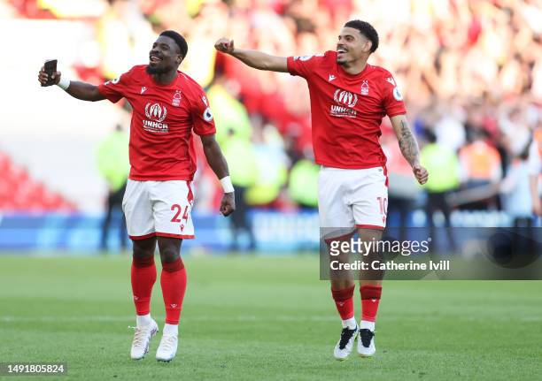 Serge Aurier and Morgan Gibbs-White of Nottingham Forest celebrate after the team's victory, which confirms their place in the Premier League for the...