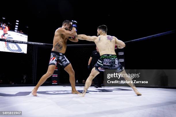 Rafael "Leprechaun" Calderon and Ubay Gonzalez fight during the Mixed Martial Arts competition "WOW 9 Mixed Martial Arts Competition" at Palacio...