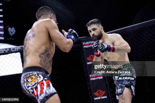 Rafael "Leprechaun" Calderon and Ubay Gonzalez fight during the Mixed Martial Arts competition "WOW 9 Mixed Martial Arts Competition" at Palacio...