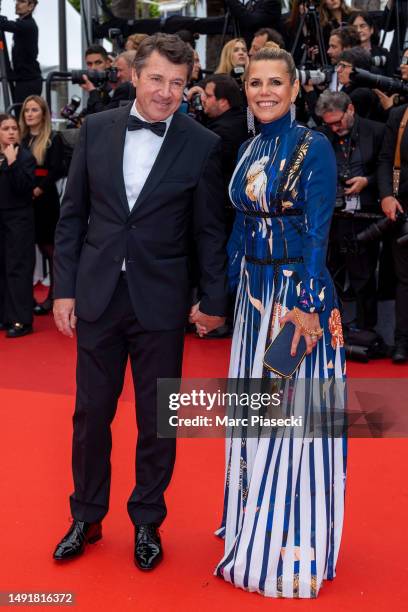 Mayor of Nice Christian Estrosi and Laura Tenoudji attend the "Killers Of The Flower Moon" red carpet during the 76th annual Cannes film festival at...