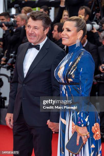 Mayor of Nice Christian Estrosi and Laura Tenoudji attend the "Killers Of The Flower Moon" red carpet during the 76th annual Cannes film festival at...