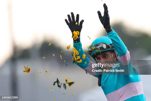 Jockey John Velazquez riding National Treasure celebrates after winning the 148th Running of the Preakness Stakes at Pimlico Race Course on May 20,...