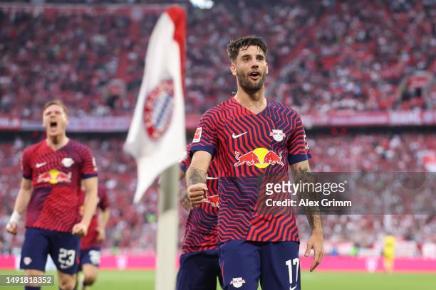 Dominik Szoboszlai of RB Leipzig celebrates after scoring the team's third goal during the Bundesliga match between FC Bayern München and RB Leipzig...