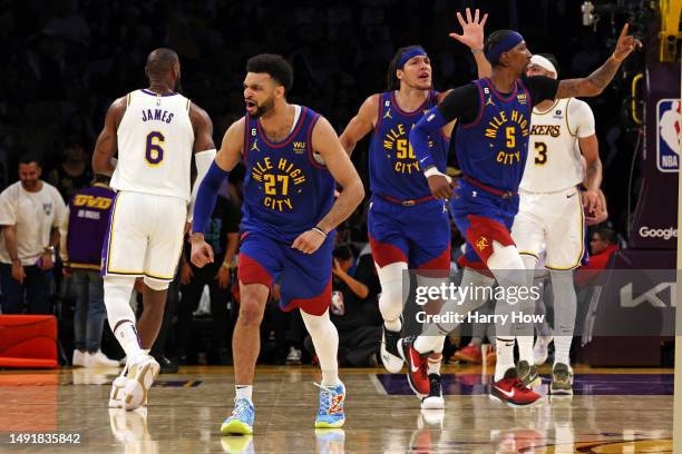 Jamal Murray of the Denver Nuggets celebrates after making a three point basket during the second quarter against the Los Angeles Lakers in game...