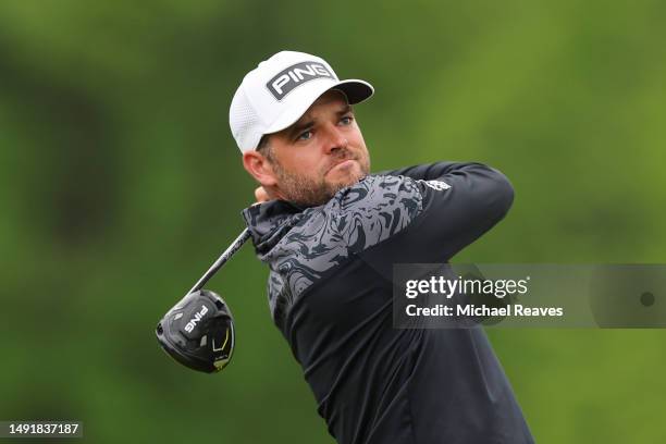 Corey Conners of Canada plays his shot from the 12th tee during the third round of the 2023 PGA Championship at Oak Hill Country Club on May 20, 2023...