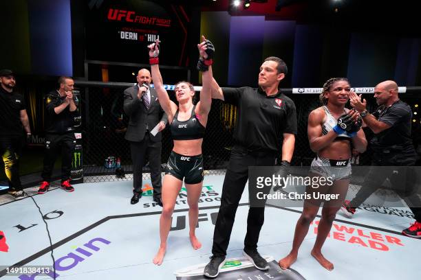 Mackenzie Dern reacts after defeating Angela Hill in a strawweight fight during the UFC Fight Night event at UFC APEX on May 20, 2023 in Las Vegas,...