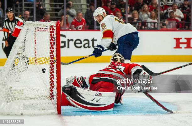 Aleksander Barkov of the Florida Panthers scores a goal against Antti Raanta of the Carolina Hurricanes during the second period in Game Two of the...