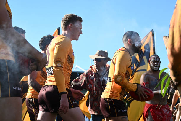 Jarman Impey of the Hawks leads out the team during the round 10 AFL match between Hawthorn Hawks and West Coast Eagles at University of Tasmania...