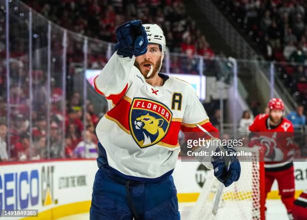 Matthew Tkachuk of the Florida Panthers celebrates after scoring the game-winning goal during overtime against the Carolina Hurricanes in Game Two of...