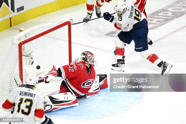 Matthew Tkachuk of the Florida Panthers scores the game winning goal on Antti Raanta of the Carolina Hurricanes in overtime in Game Two of the...