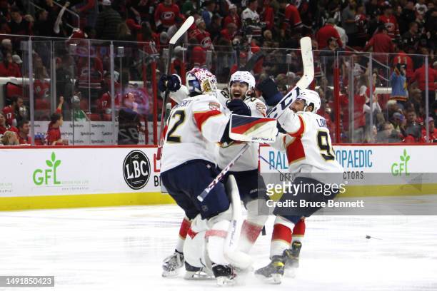 Sergei Bobrovsky of the Florida Panthers celebrates with his teammates after defeating the Carolina Hurricanes in overtime of Game Two of the Eastern...
