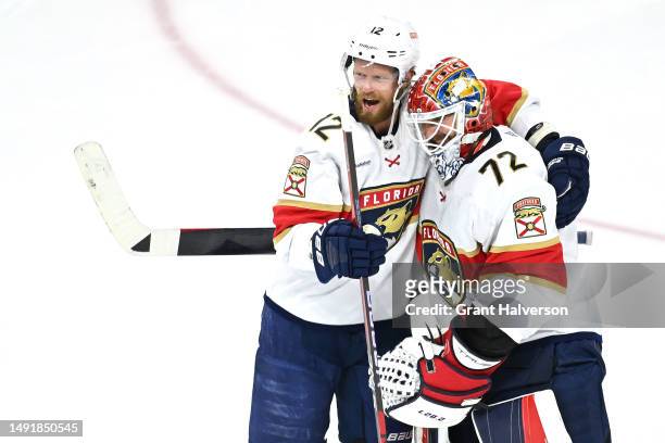 Sergei Bobrovsky of the Florida Panthers celebrates with Eric Staal after defeating the Carolina Hurricanes in Game Two of the Eastern Conference...