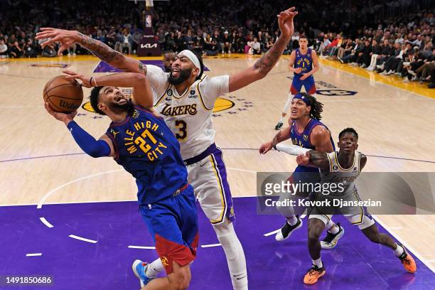 Jamal Murray of the Denver Nuggets shoots the ball against Anthony Davis of the Los Angeles Lakers in game three of the Western Conference Finals at...