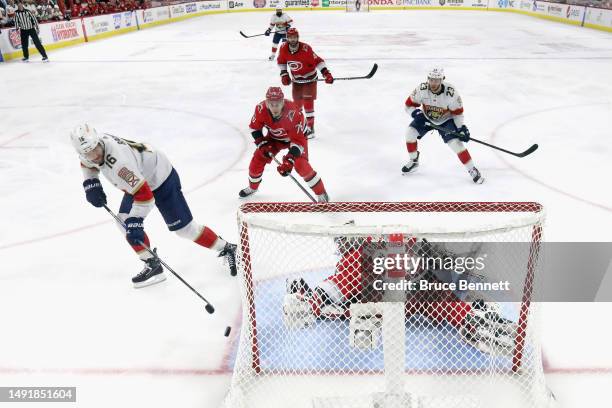 Aleksander Barkov of the Florida Panthers shoots the puck to score a goal on Antti Raanta of the Carolina Hurricanes during the second period in Game...