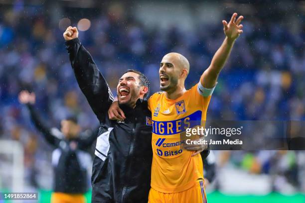 Fernando Gorriaran and Guido Pizarro of Tigres celebrate after winning the semifinals second leg match between Monterrey and Tigres UANL as part of...