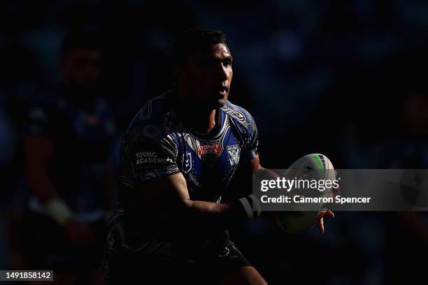 Tevita Pangai Junior of the Bulldogs runs the ball during the round 12 NRL match between Canterbury Bulldogs and Gold Coast Titans at Accor Stadium...