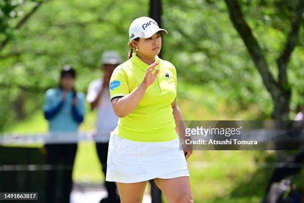Ai Suzuki of Japan acknowledges the gallery after the eagle on the 16th green during the final round of Bridgestone Ladies Open at Chukyo Golf Club...
