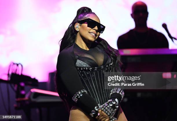 Singer Ashanti performs onstage during "An Evening Of R&B" concert at Mable House Barnes Amphitheatre on May 20, 2023 in Mableton, Georgia.