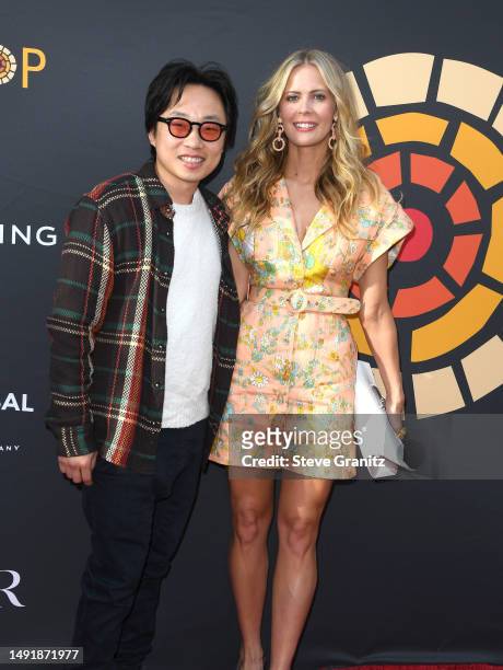 Jimmy O. Yang, Brianne Kimmel arrives at the Charlize Theron Africa Outreach Project 2023 Block Party at Universal Studios Backlot on May 20, 2023 in...