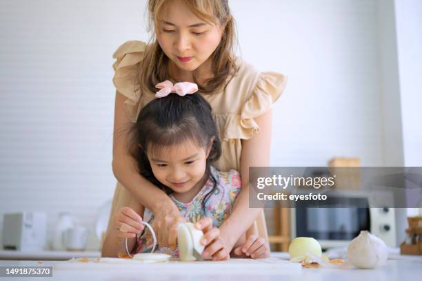 mother and daughter prepare healthy food in the kitchen. - sandwich generation stock pictures, royalty-free photos & images