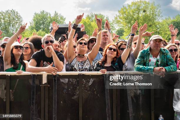 Festival goers enjoy the music at the Let's Rock The Moor Festival 2023 on May 20, 2023 in Cookham, England.