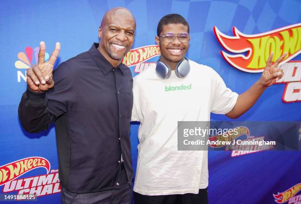 Terry Crews and Isaiah Crews attend Press Event For NBC's "Hot Wheels: Ultimate Challenge at The Zimmerman Automobile Driving Museum on May 20, 2023...