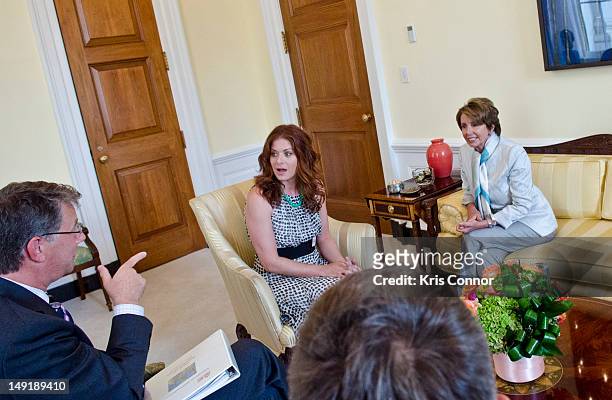 Debra Messing and Nancy Pelosi speak as Messing is making a round of meetings on behalf of Population Services International during the 19th...