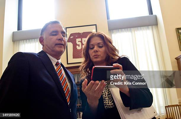 John Boozman and Debra Messing speak during the 19th International AIDS conference in the Hart Senate Office building on July 24, 2012 in Washington,...