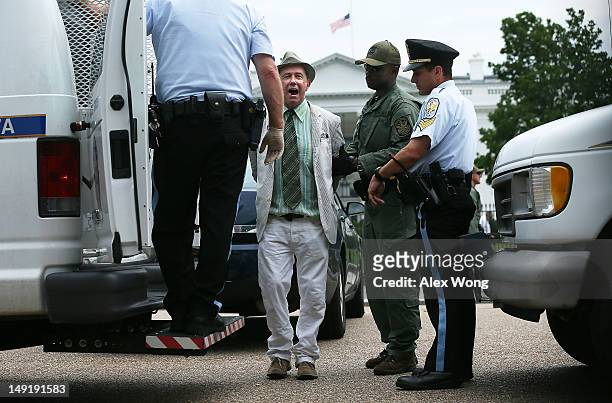 Park Police arrest an Treatment Action Group executive director Mark Harrington who participates in a civil disobedience outside the White House...