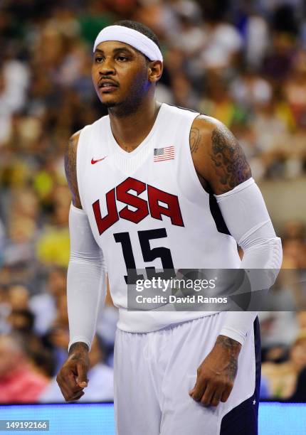 Carmelo Anthony of the US Men's Senior National Team looks on during a Pre-Olympic Men's Exhibition Game between USA and Spain at Palau Sant Jordi on...