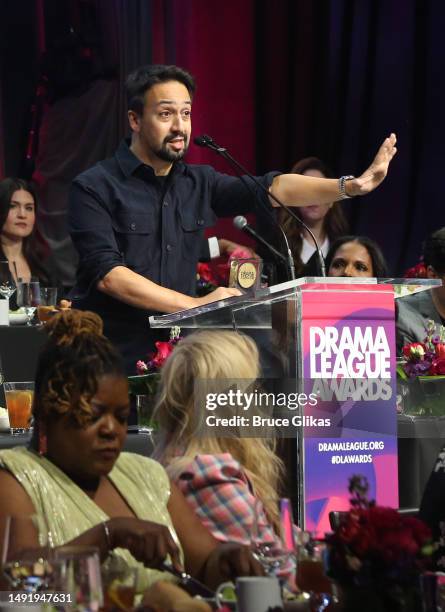 Lin-Manuel Miranda accepts his award during the 89th Annual Drama League Awards at The Ziegfeld Ballroom on May 19, 2023 in New York City.