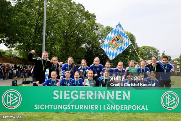 The team of bayern celebrates winning the U14 Junior Girls Sighting Tournament at Sport School Wedau on May 21, 2023 in Duisburg, Germany.