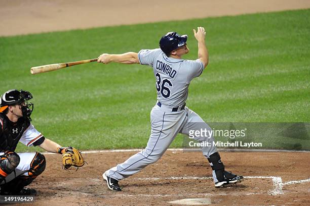 Brooks Conrad of the Tampa Bay Rays takes a swing during the seventh inning of a baseball game against the Baltimore Orioles on July 24, 2012 at...