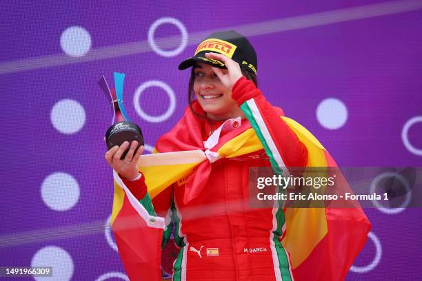 Marta Garcia of Spain and PREMA Racing celebrates on the podium following race 3 for the F1 Academy Series Round 3:Barcelona at Circuit de...