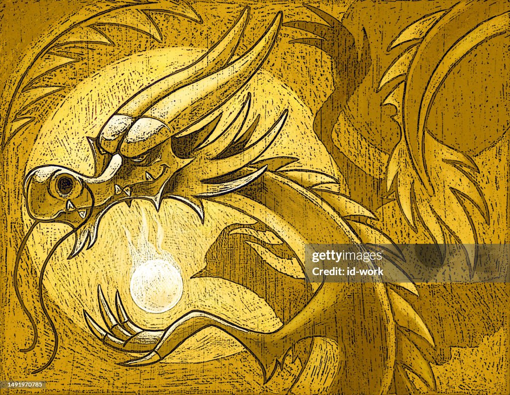 Dragon holding flaming ball