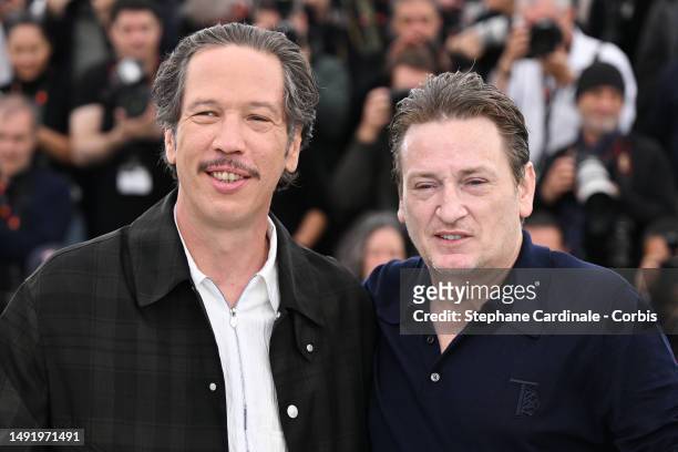 Reda Kateb and Benoit Magimel attend the "Omar La Fraise " photocall at the 76th annual Cannes film festival at Palais des Festivals on May 21, 2023...