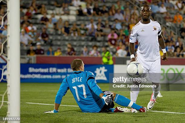 Leroy Lita of Swansea City shoots the ball just wide of the net as goalkeeper Ian Joyce of the Colorado Rapids defends the goal during the second...