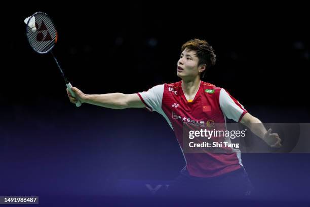 Shi Yuqi of China competes in the Men's Single Final match against Lee Yun Gyu of Korea during day eight of the Sudirman Cup at Suzhou Olympic Sports...