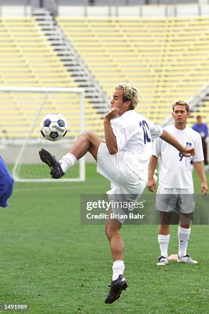 Landon Donovan of the San Jose Earthquakes intercepts the ball during practice drills in preparation for the MLS Cup Sunday against the Los Angeles...