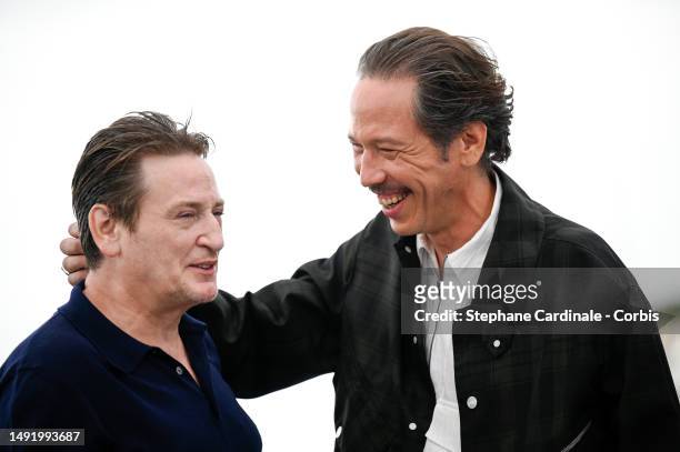 Benoit Magimel and Reda Kateb attends the "Omar La Fraise " photocall at the 76th annual Cannes film festival at Palais des Festivals on May 21, 2023...