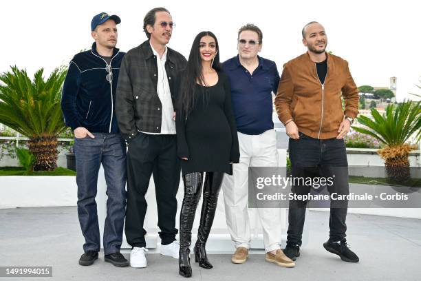 Elias Belkeddar, Reda Kateb, Meriem Amiar, Benoît Magimel and a guest attend the "Omar La Fraise " photocall at the 76th annual Cannes film festival...