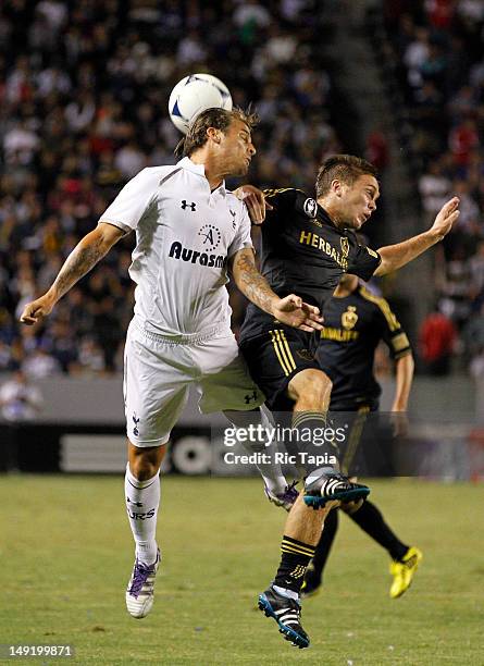 David Bentley of the Tottenham Hotspur heads the ball against Michael Stephens of Los Angeles Galaxy during the second half of the international...