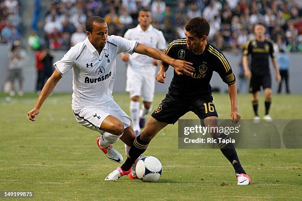 Andros Townsend of the Tottenham Hotspur is tripped by Hector Jimenez of Los Angeles Galaxy during the international friendly match at The Home Depot...