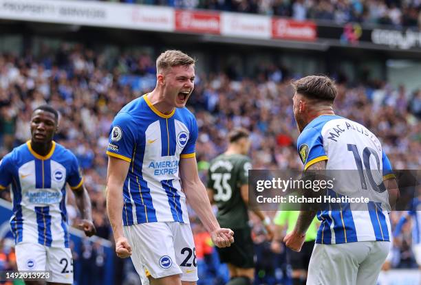 Evan Ferguson of Brighton & Hove Albion celebrates with teammate Alexis Mac Allister after scoring the team's first goal during the Premier League...