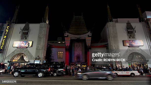 The lights on the facade and forecourt of Grauman's Chinese Theatre are darkened for 60 seconds in response to the Aurora, Colorado movie theatre...