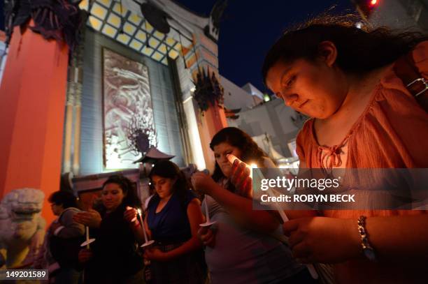 Teresa Avila attends a candlelit vigil for the victims and survivors of the Aurora, Colorado movie theatre shooting, at Grauman's Chinese Theatre in...