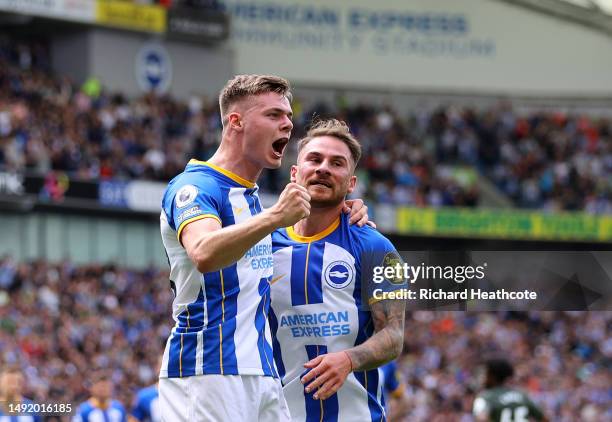 Evan Ferguson of Brighton & Hove Albion celebrates with teammate Alexis Mac Allister after scoring the team's first goal during the Premier League...